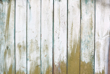 Old wood surface with peeling paint. Texture or background.