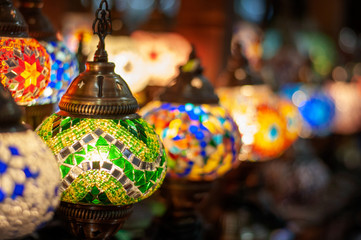 Multi-colored lamps in the eastern bazaar. Shop of oriental souvenirs.