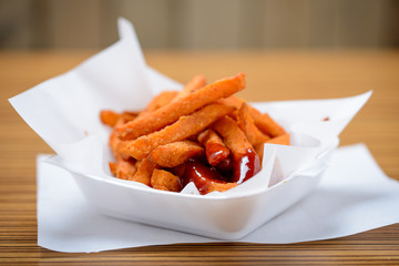 Sweet potato fries to take away with copy space