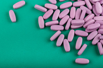 pills on a green background