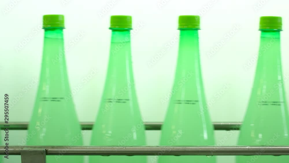 Poster plastic bottles factory working inline production, automated