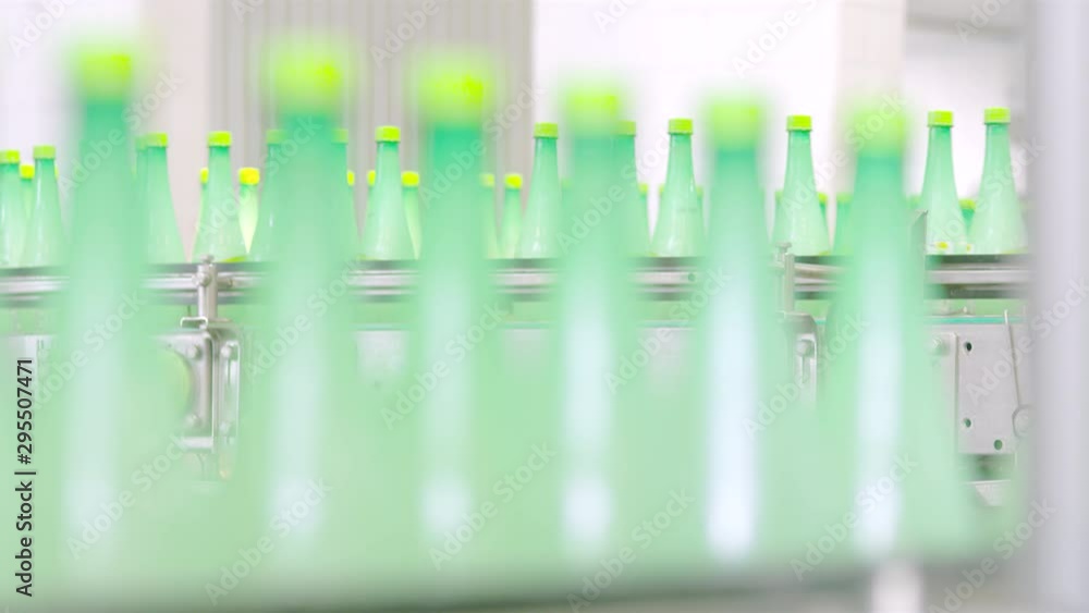 Poster plastic bottles factory working inline production, automated
