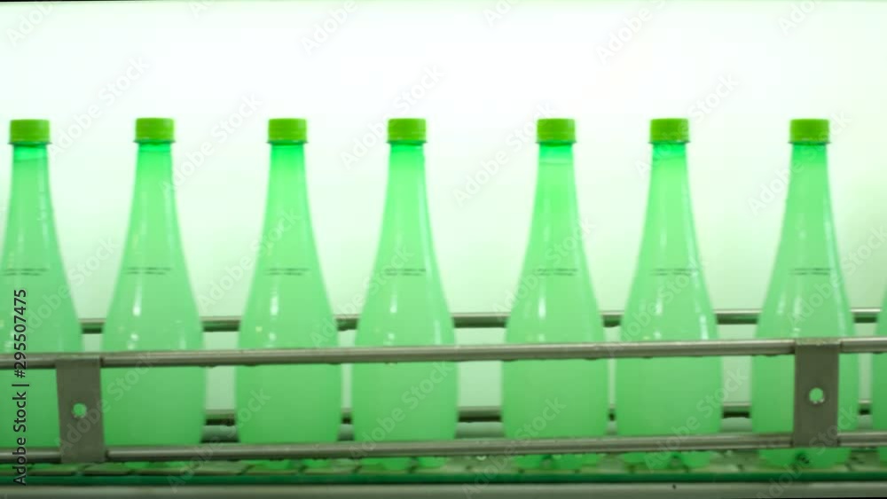 Poster plastic bottles factory working inline production, automated