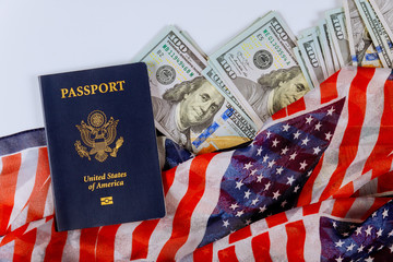 American flag on top of American dollar banknotes in different positions and US Passports