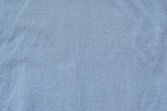 Blue cotton seamless fabric. Texture background