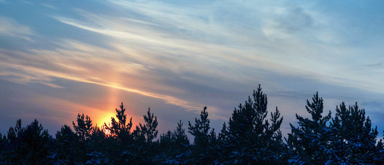 Fototapeta premium A ray of sunlight illuminated the morning sky