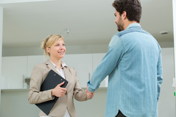 Fototapeta premium portrait of woman showing an apartment