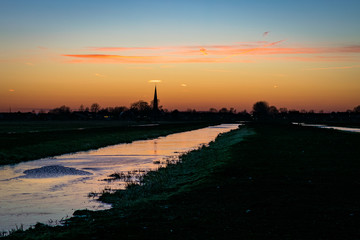 Beautiful twilight sky over the dutch landscape 