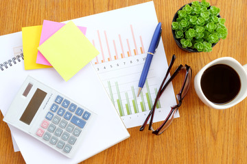 graph paper and note book in business concept