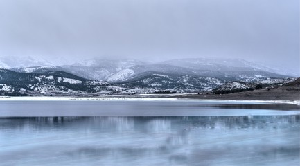 Beautiful winter landscape scene of a snowy lake at winter, Salda Lake, Turkey