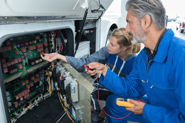 female apprentice electrical engineers in cable finishing factory