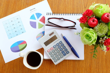 graph paper and note book in business concept