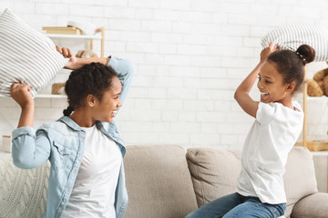 Fototapeta premium Two adorable girls having fun at home