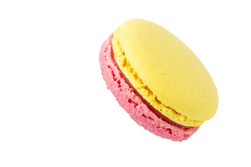 Tender yellow pink macaroons isolated on white background.