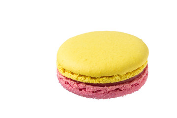 Tender yellow pink macaroons isolated on white background.