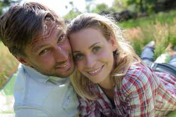 Fototapeta premium young couple on grass