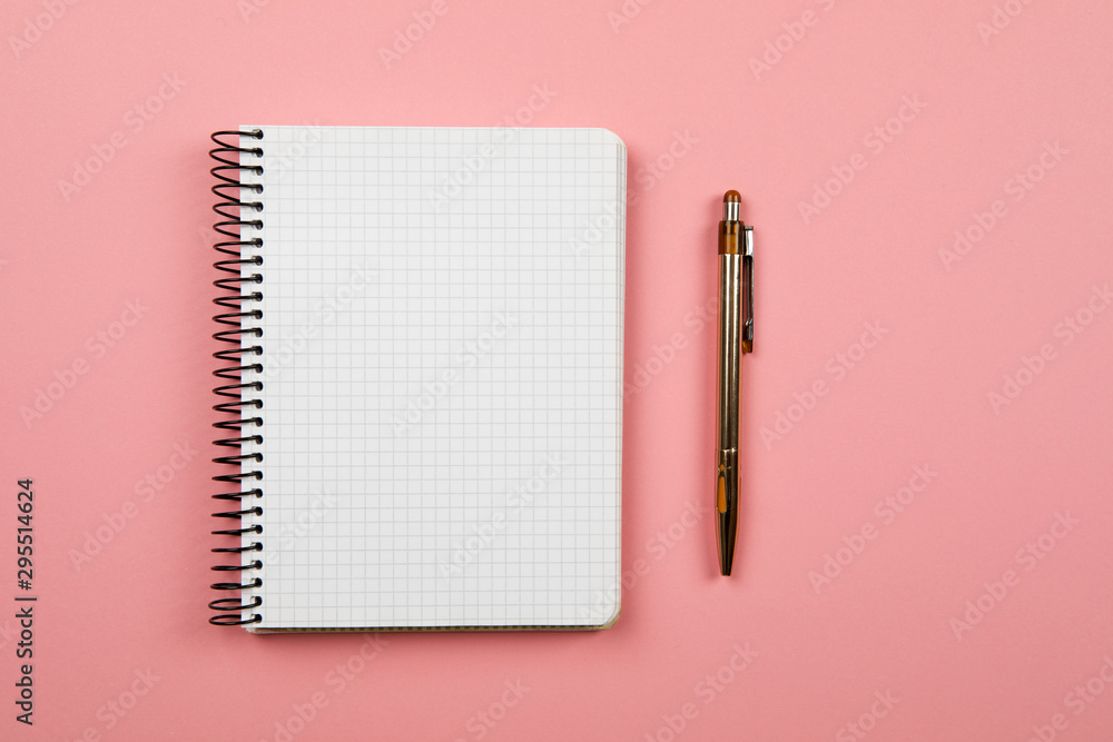 Poster the white open notepad isolated on the pink background