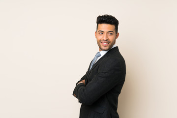 Young handsome businessman man over isolated background laughing