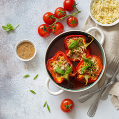 Bell peppers filling with vegetables, bulgur and cheese