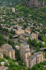 Fototapeta na wymiar Panoramic View of the mountainous city of Chiatura, famous for its manganese mines located on the river Kvirila, Georgia.
