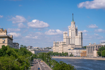 Fototapeta na wymiar Moscow view with Kotelnicheskaya high rise building and Moscow river on sunny summer day.