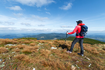 girl athlete on top of the mountain.