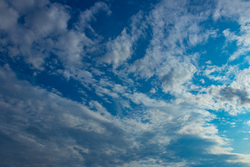 Sunny clouds on a summer day. Bright sunny day.