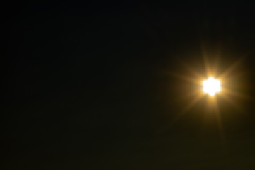 Pure sun on a dark background.