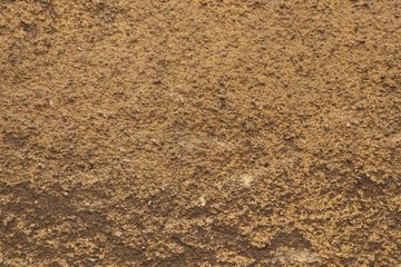 rough concrete putty dark sand color