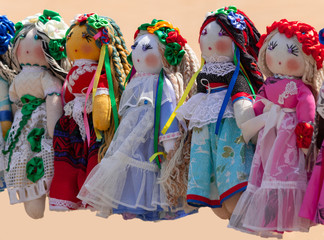 Handmade dolls are sewn in national style.