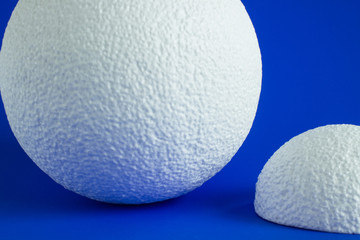 Large white foam ball on bright background