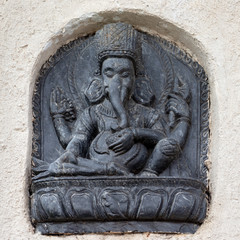 Statue of hindu god ganesha on the wall in the ethnic centre