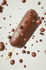 icecreme with chocolate and around flying choco balls