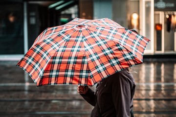 man with umbrella in the rain