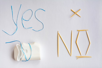 dental floss instead of toothpicks, the harm from the use of toothpicks oral care concept, caries prevention