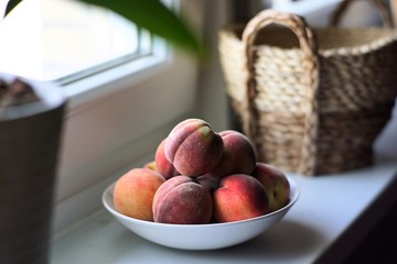 peaches. fruit still life. natural light from the window
