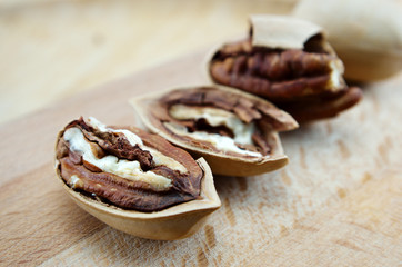 pecan close-up macro high resolution on wooden background