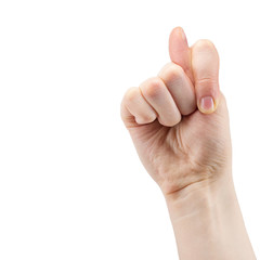 female hand is showing a Fig isolated on a white background, the sign of failure