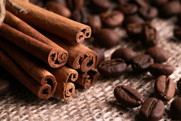 Obraz na płótnie Canvas Cinnamon Sticks and Roasted Coffee Grains