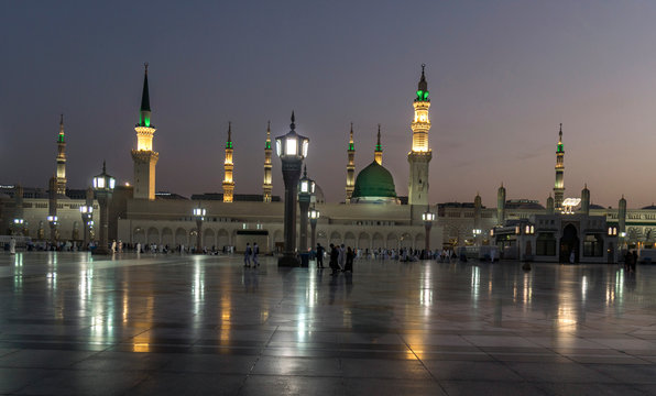 Muslims wearing traditional clothing in the temple of the Nabawi Mosque
