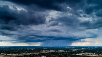 Ominous Sky with Storm Cell and Rain Clouds over the City