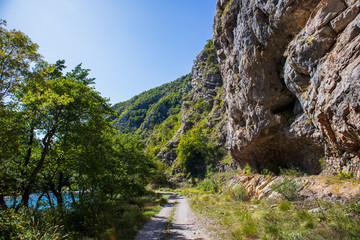 Footpath next to the rocks and mountains and Una river in village Martin Brod in Bosnia and...