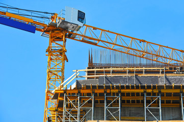 Crane and highrise construction site