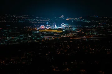 High-Angle view of the "Cannstatter Wasen Volksfest"  at night time © Timo Günthner
