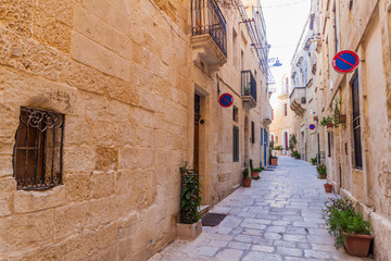Typical narrow street in Birgu town, Malta