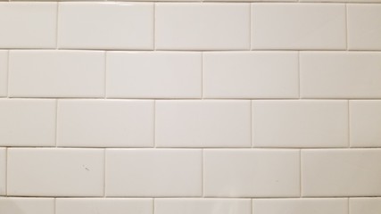Naklejka premium background of white tile wall