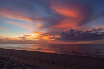Fototapeta na wymiar Sunset on a tropical, sandy beach of Kho Kho Khao, Thailand