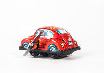 Fototapeta premium car tin toy on white background