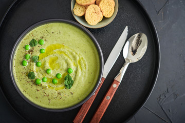 Green pea soup with croutons