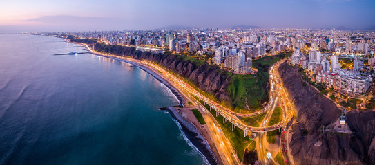 Aerial view of Lima city from Miraflores at blue time. - obrazy, fototapety, plakaty